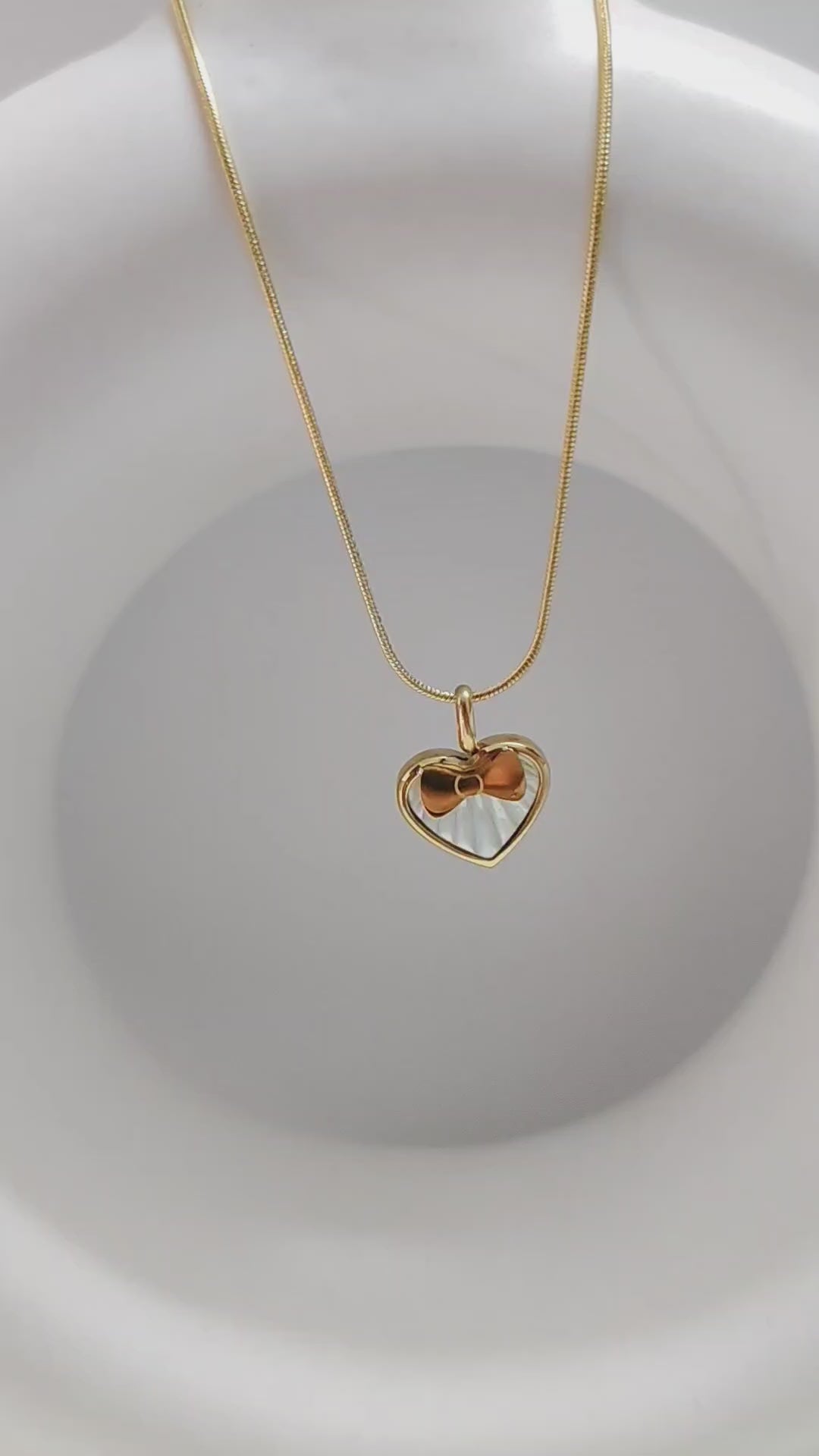Heart in a bow necklace
