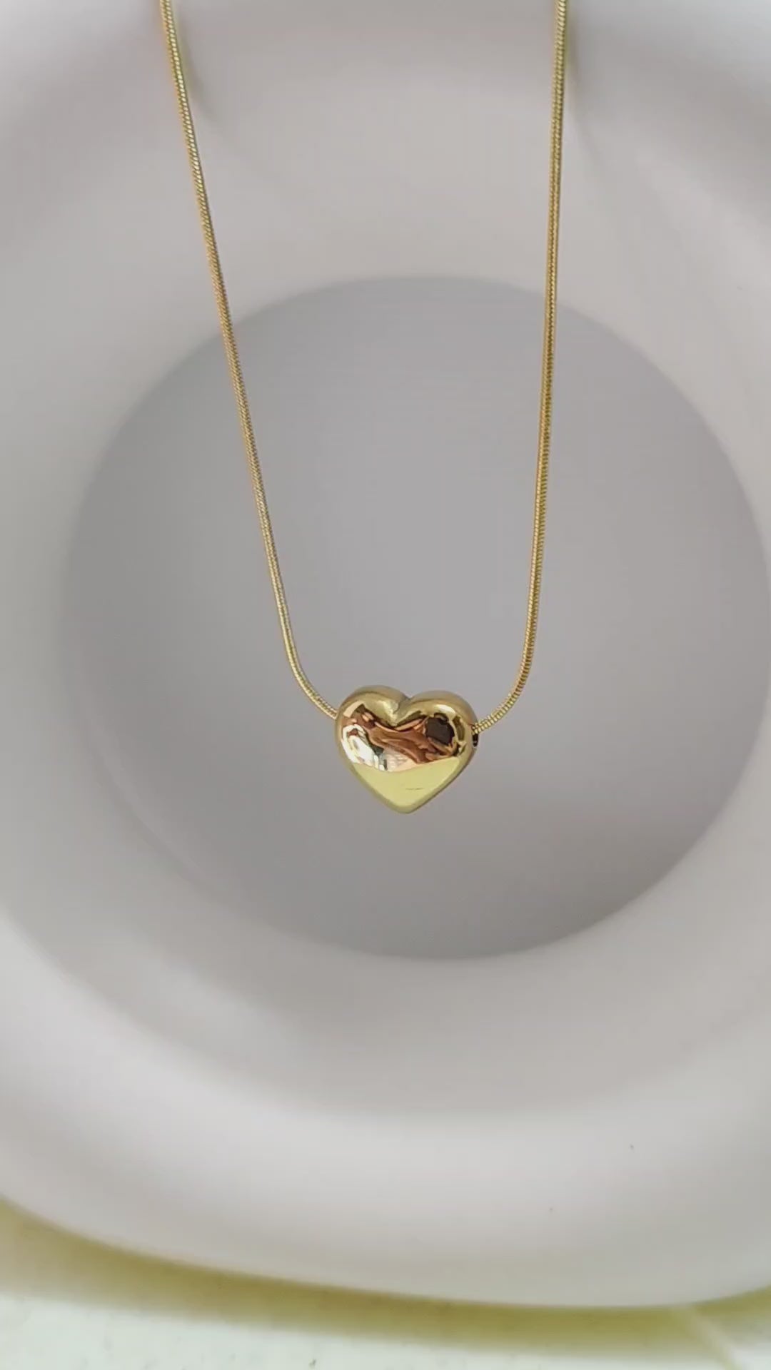 Gold guild heart necklace
