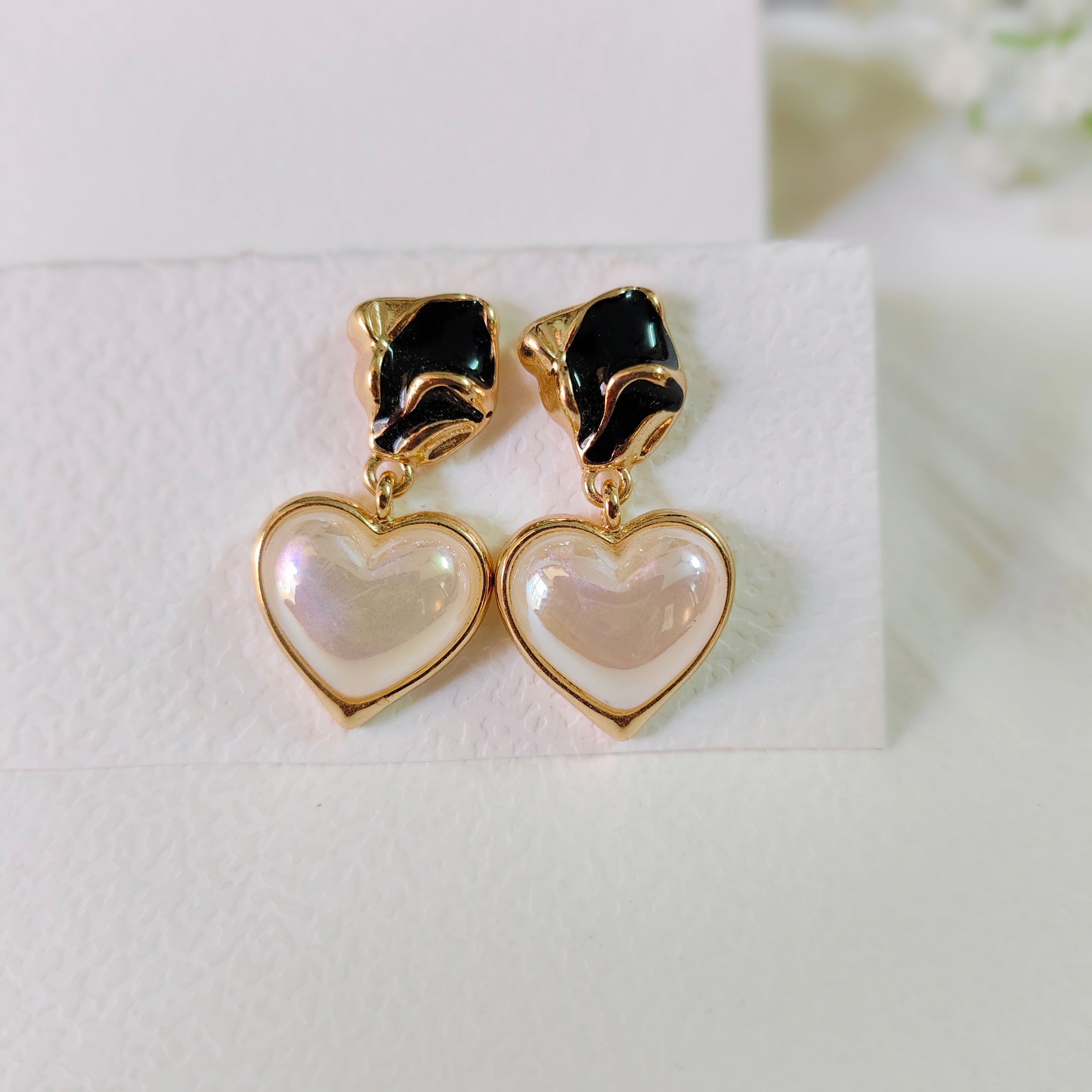 Magic heart earring