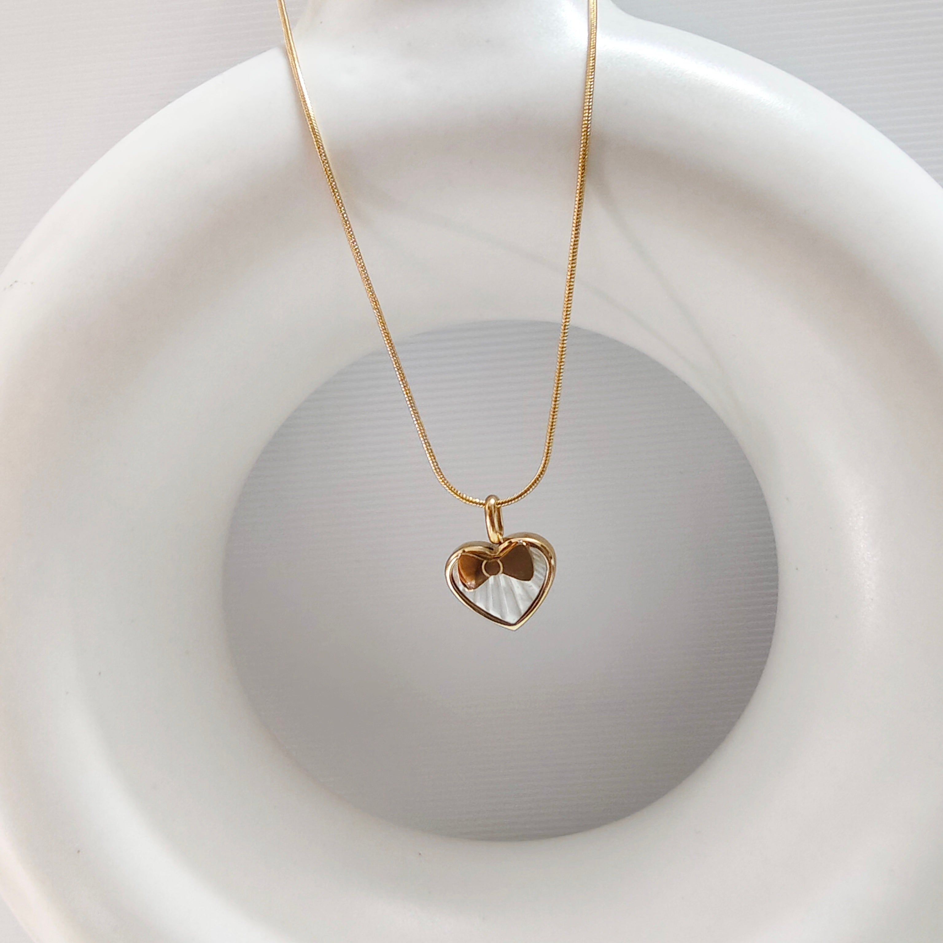 Heart in a bow necklace