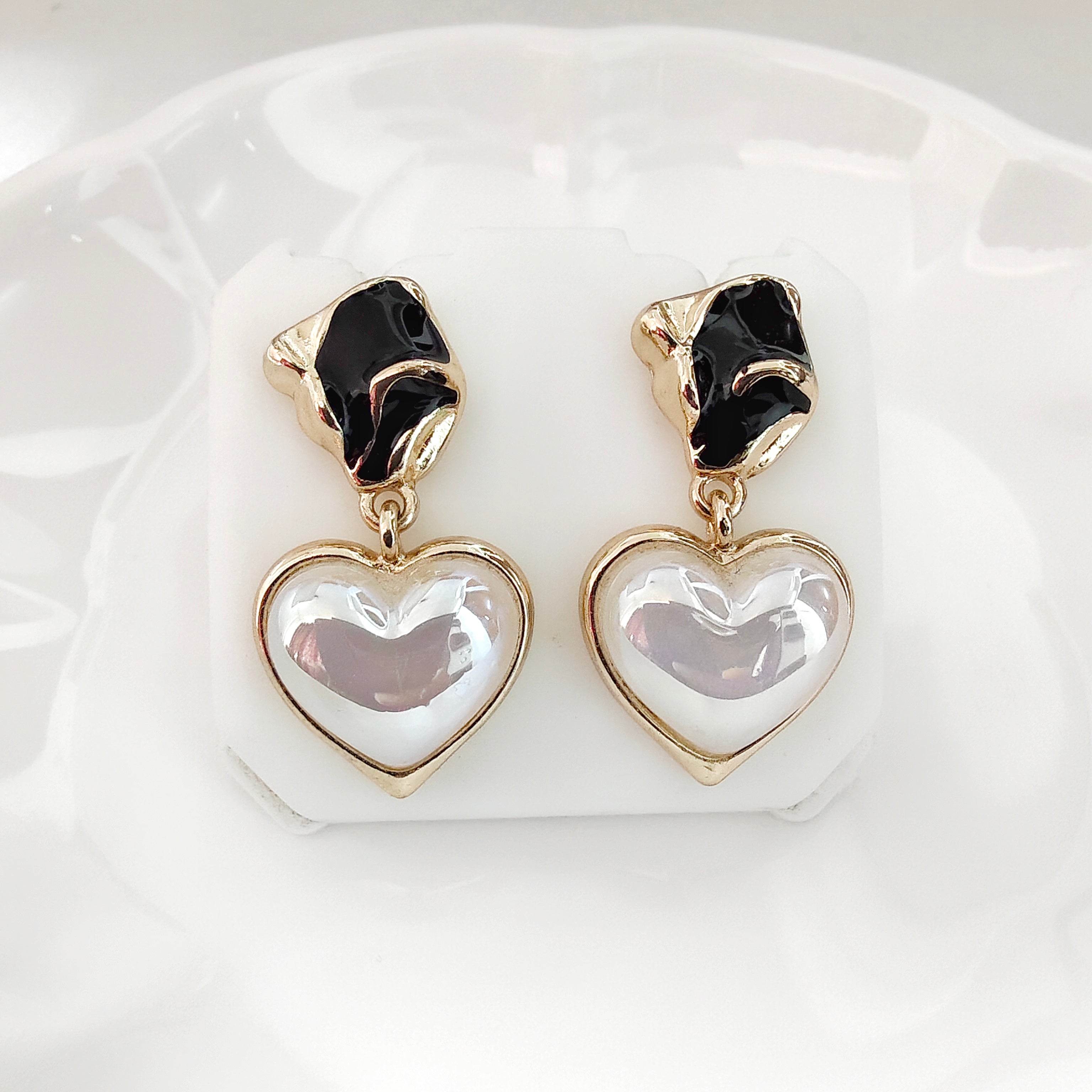 Magic heart earring