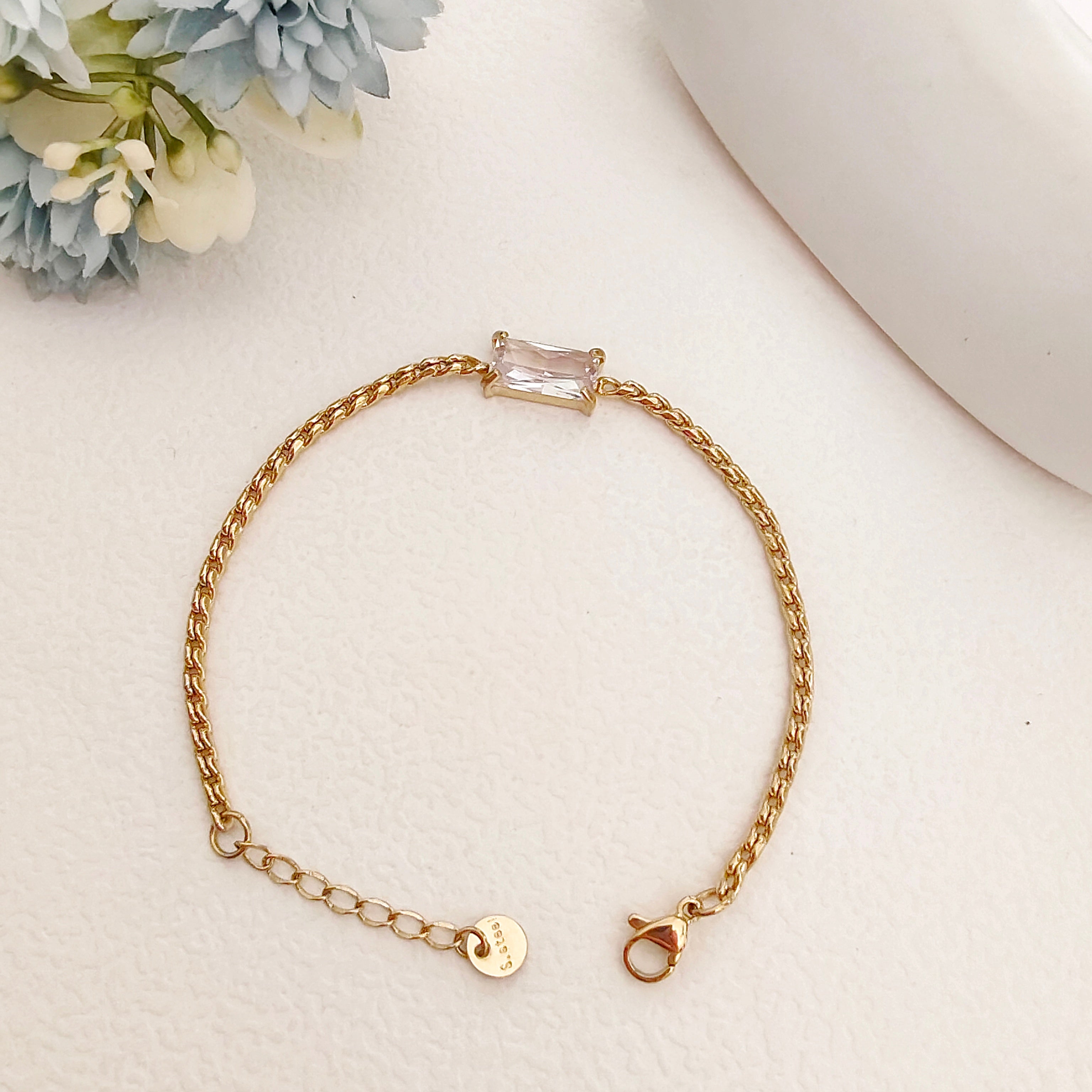 Emerald with twisted chain bracelet