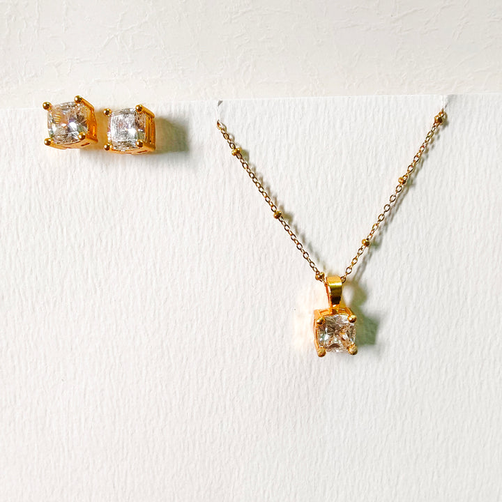 Square cushion cut pendant set