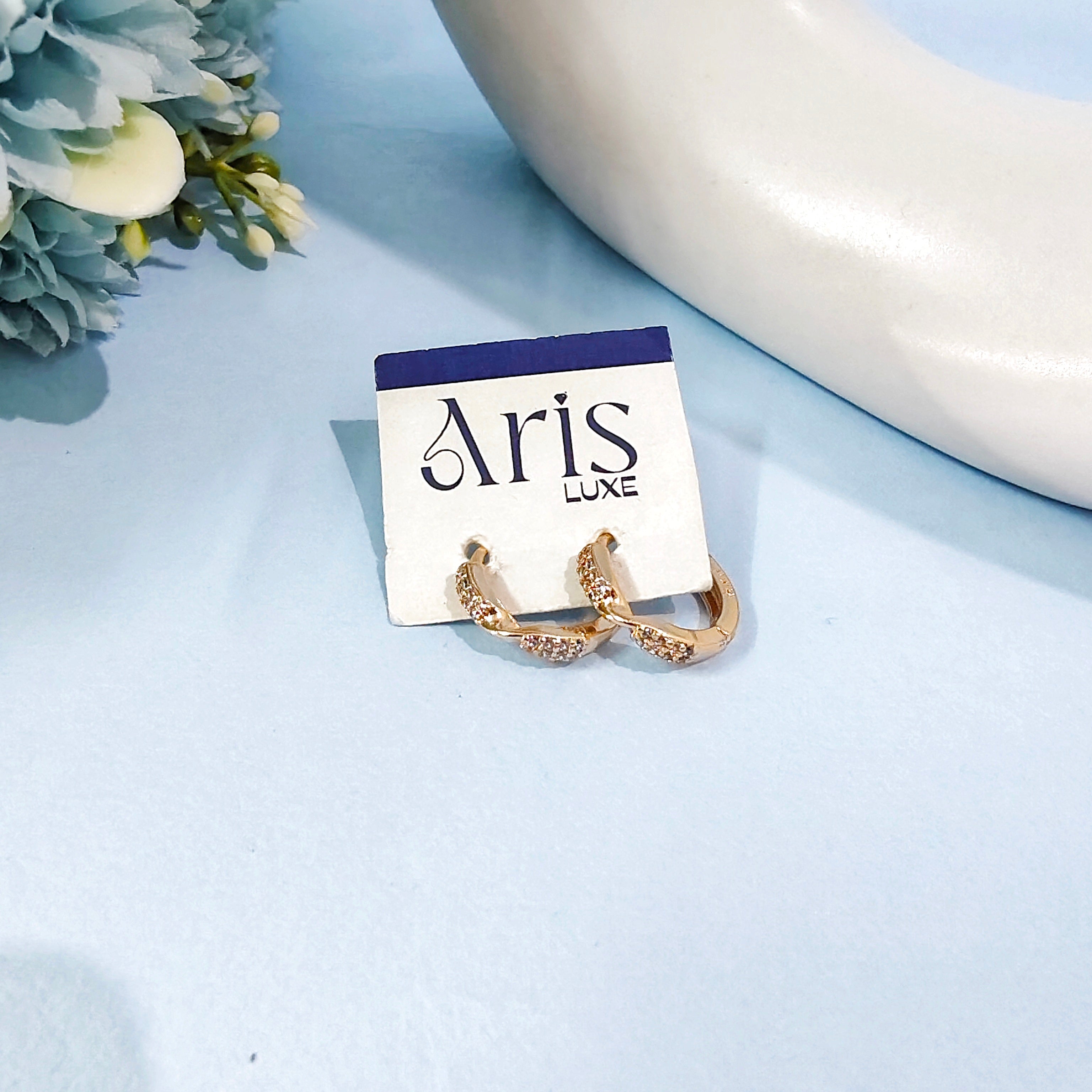 Twist & shine bali earring