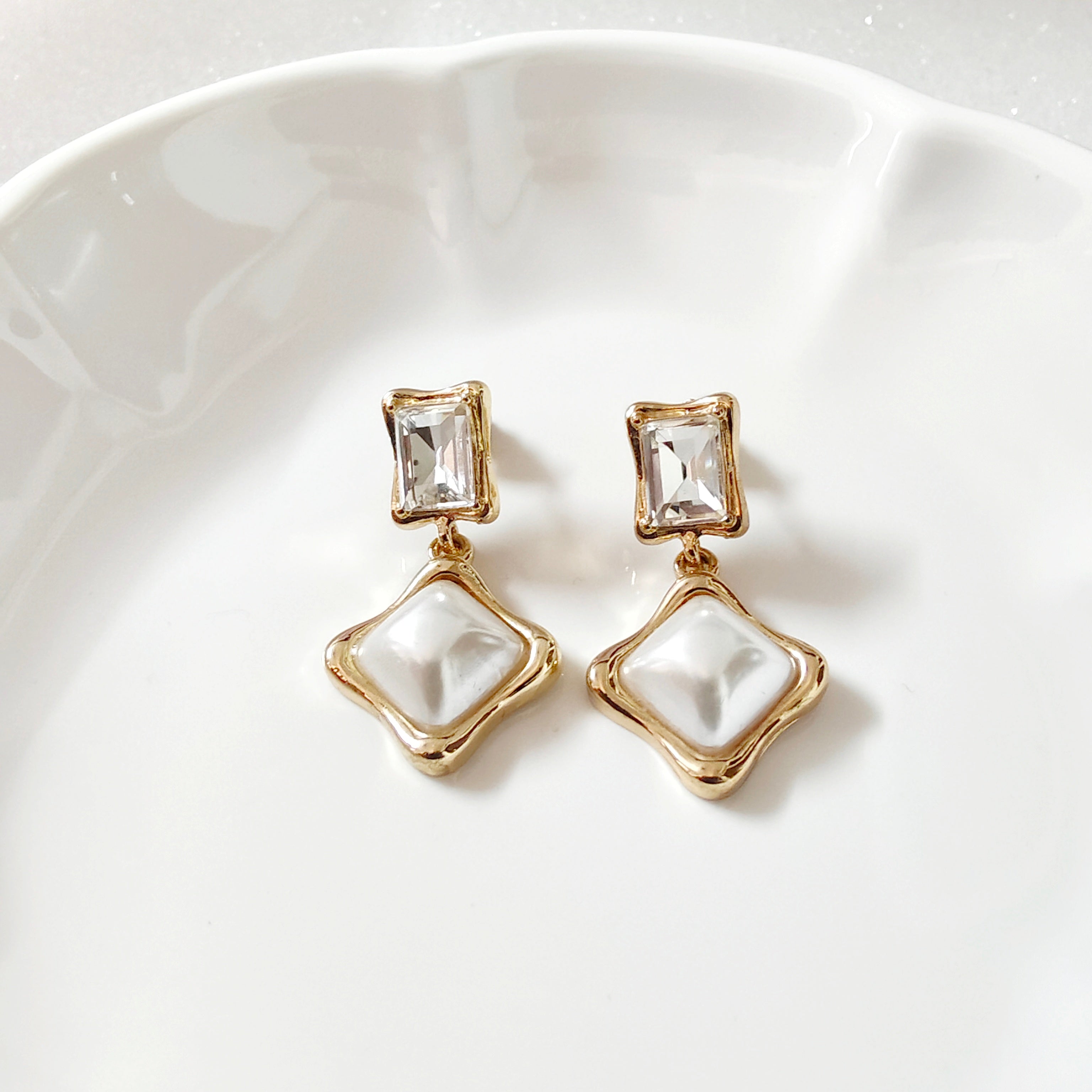 Faux pearl earring