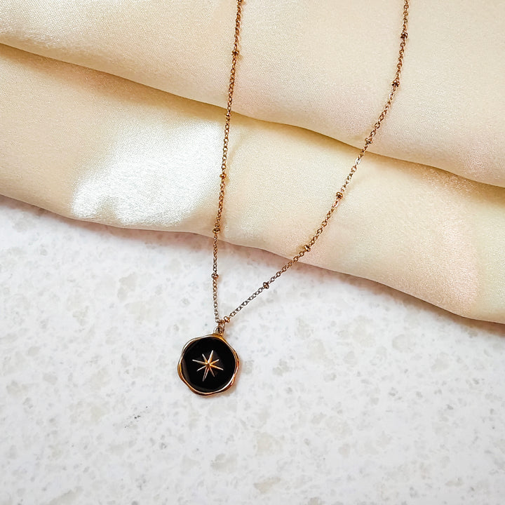 BLACK ENAMEL STAR NECKLACE