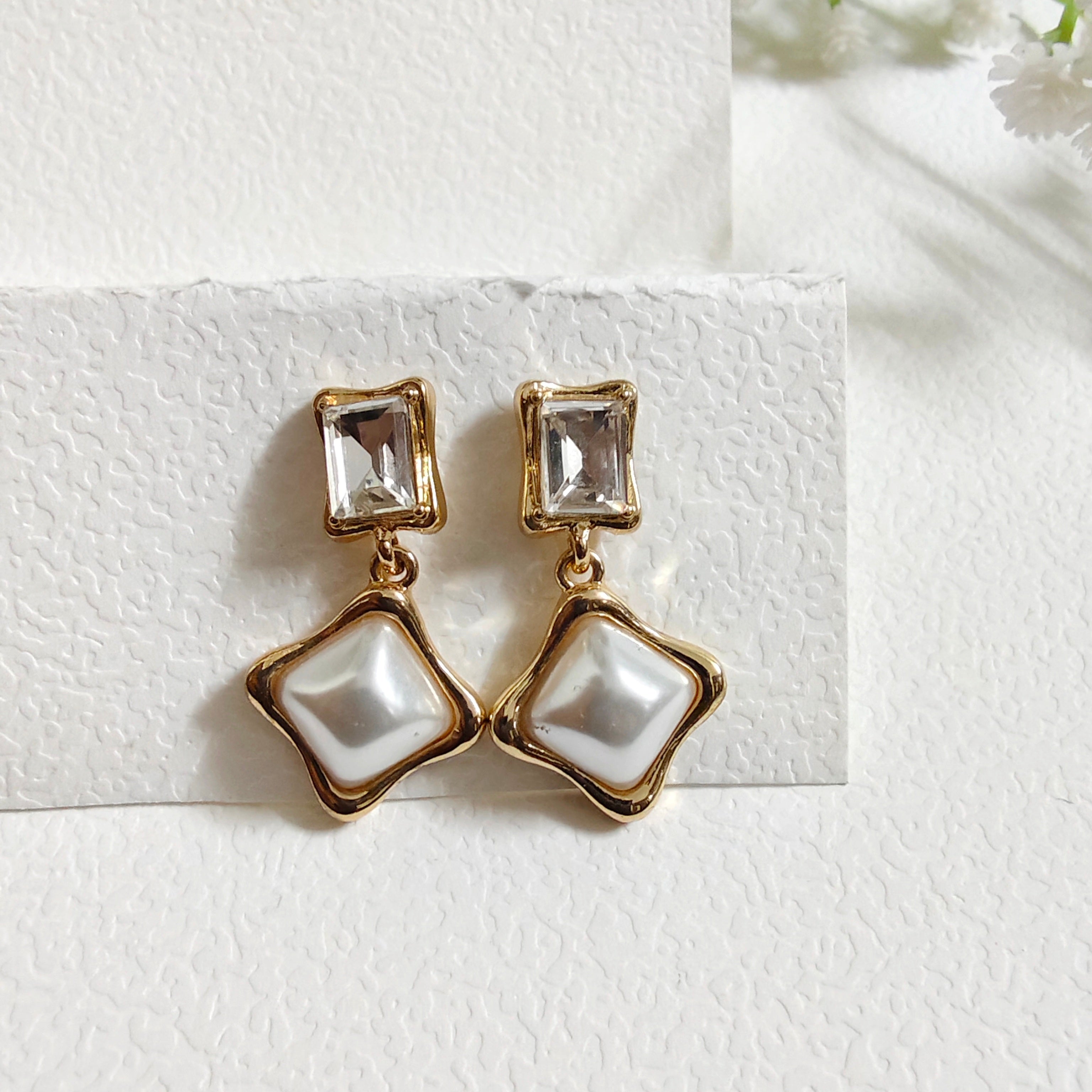 Faux pearl earring